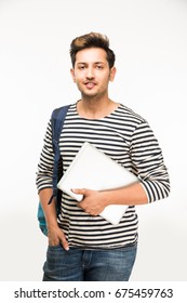 Handsome Indian/Asian Male College Student Standing With Laptop Computer, Against White Background, Isolated