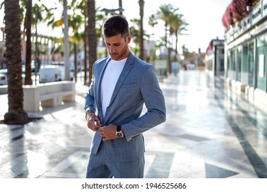 Handsome Italian Man Walking On The City Street Wearing Elegant Fashionable Suit. Modern Businessman.