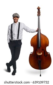 Handsome Jazzman Holding His Double Bass. Wearing Suspenders And Flat Cap, Isolated On White Background. Young Musician, Soul, Swing.