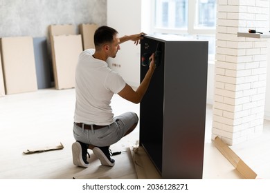 handsome joiner work in carpentry. He is successful entrepreneur at his workplace. - Shutterstock ID 2036128271