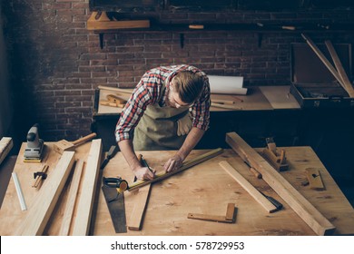 handsome joiner work in carpentry.  He is successful entrepreneur at his workplace. - Shutterstock ID 578729953