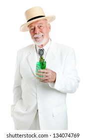 Handsome Kentucky Colonel Or Southern Gentleman Drinking A Mint Julep For Derby Day.  Isolated On White.