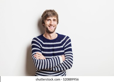 Handsome Laughing Young Man Studio Portrait