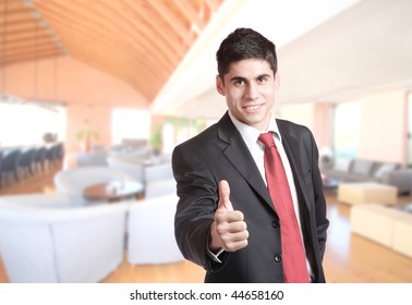 A Handsome Male Hotel Manager In The Lobby