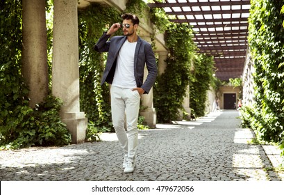 Handsome Male Model Wear Fashionable Clothes And Aviator Sunglasses