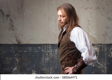 Handsome male Steam punk. Retro man portrait over grunge background. - Shutterstock ID 580064971