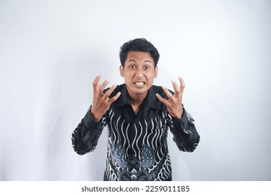 Handsome man annoyed angry in furious gesture on white background - Shutterstock ID 2259011185