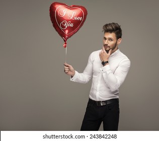 Handsome Man With Balloon Heart Thinking