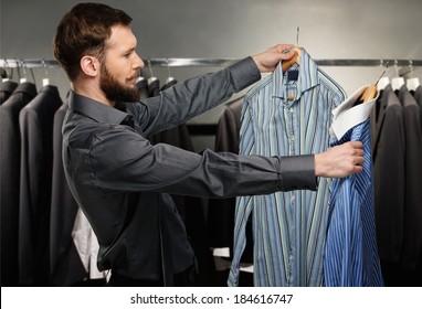 31,709 Man choosing clothes Images, Stock Photos & Vectors | Shutterstock