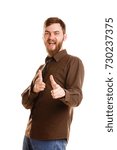 Handsome man with beard posing and standing isolated on a white background.