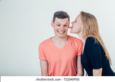 Handsome Man With Beautiful Sexy Woman Licking Man Cheek.