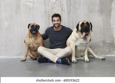 Handsome Man In Between Two Dogs, Portrait