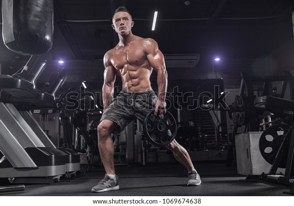 Handsome Man Big Muscles Posing Camera Stock Photo 1069674638 ...