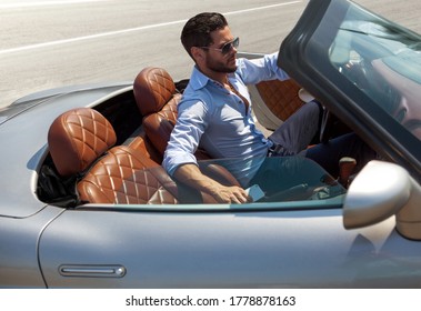 Handsome Man In The Car.