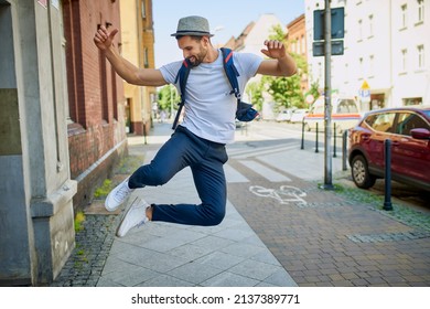 Handsome Man Dancing Jumping On City Street