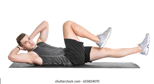 Handsome Man Doing Bicycle Crunch On White Background