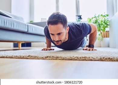 Handsome Man Doing Pushups At Home 