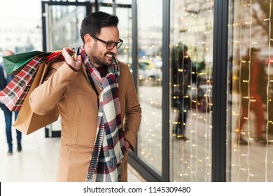 Handsome Man Doing Shopping In The City 