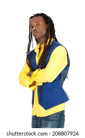 Handsome man with dreadlocks doing different expressions in different sets of clothes: arms crossed