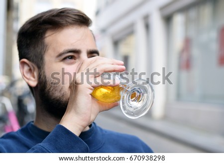 Similar – Image, Stock Photo Portrait of a young man with a beer glass in his hand