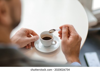 Handsome Man Drinking Hot Espresso In Cafe