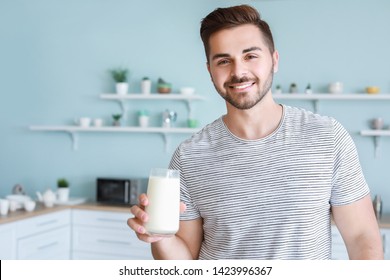 Handsome Man Drinking Tasty Milk Kitchen Stock Photo 1423996367 ...