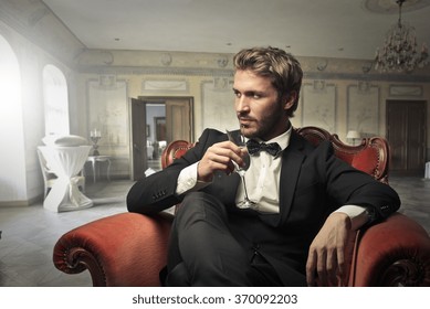 Handsome Man Drinking Wine