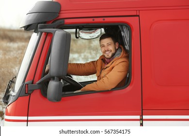 Handsome Man Driving Big Modern Truck