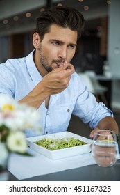 Handsome Man Eating Pasta