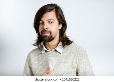 Handsome Man Embarrassed, With Long Hair, Isolated Studio Photo