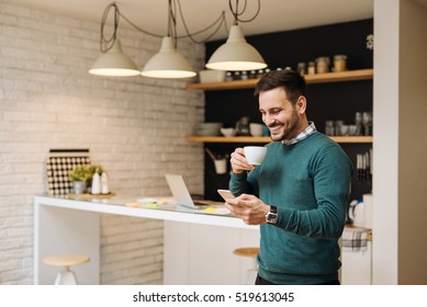 Handsome man enjoying time for internet and coffee. - Powered by Shutterstock