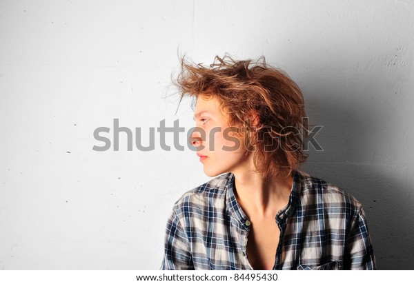 Handsome Man Funky Hairstyle Casually Leaning Stock Photo
