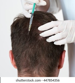 Handsome Man Is Getting Injection In Head. Concept Of Mesotherapy.