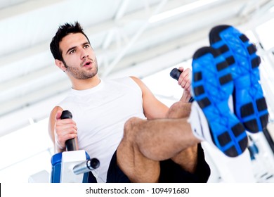 Handsome Man At The Gym Working Out