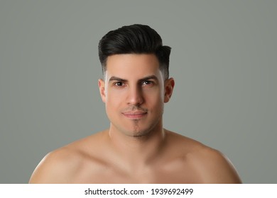 Handsome Man With Half Shaved Face On Grey Background