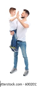 Handsome Man With His Son On White Background