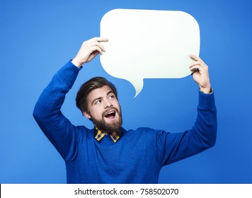 Handsome Man Holding Speech Bubble
