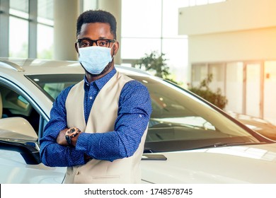 Handsome Man In Medical Mask Is Standing Near His New Car And Smiling