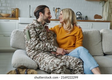 Handsome Man In Military Talking To His Wife After Coming Home From War