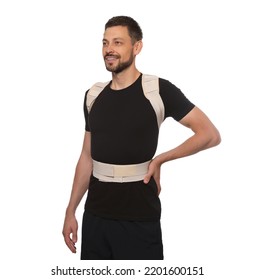 Handsome Man With Orthopedic Corset On White Background