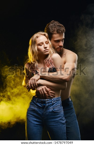 When a man hugs a woman tightly