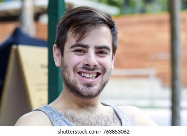 Handsome Man Portrait Outside Smiling On A Sunny Summer Day