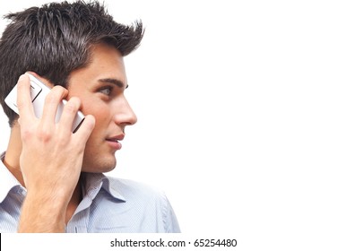 Handsome Man Portrait Talking At The Cell Phone Isolated On White Background