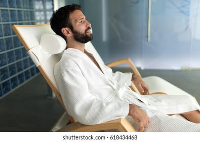 Handsome man relaxing enjoying spa treatment