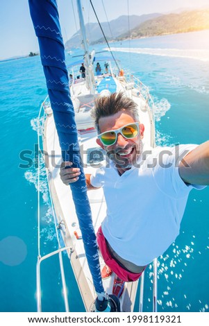 Handsome Man resting On Yacht in Greece