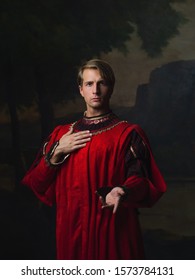 Handsome Man In A Royal Red Doublet. Young Man, Portrait In Renaissance Style Paintings