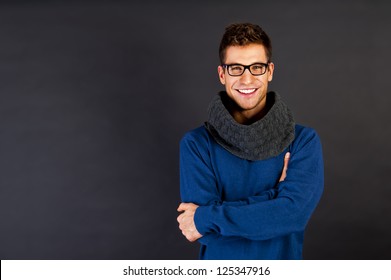 Handsome Man With Scarf And Smile On Black Background