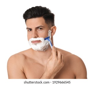 Handsome man shaving with razor on white background - Powered by Shutterstock