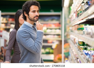 Asian Man Choosing Orange Juice Supermarket Stock Photo 1408873409 ...