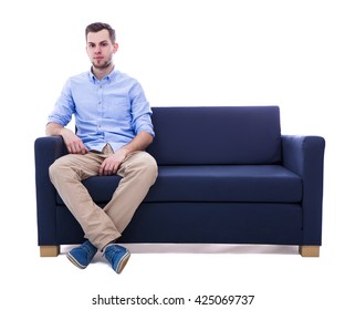 Handsome Man Sitting On Sofa Isolated On White Background